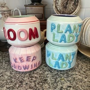 Set of 4 Anthropologie replica planters .